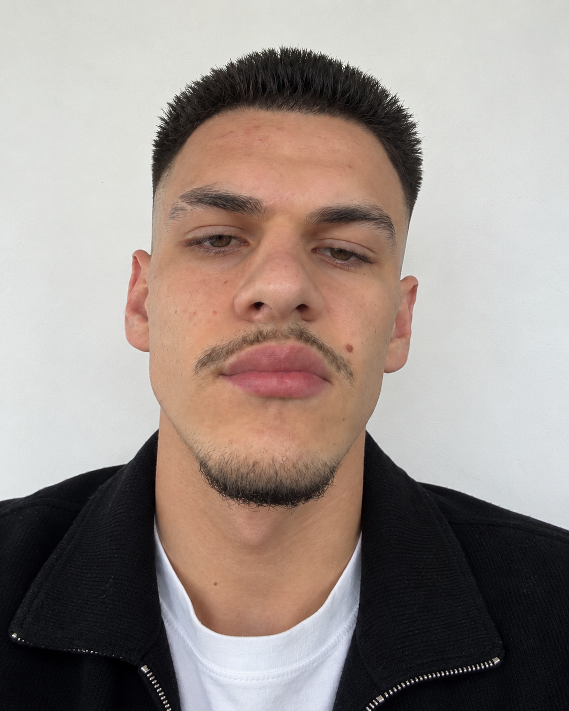 Portrait of Julian Saliqunaj